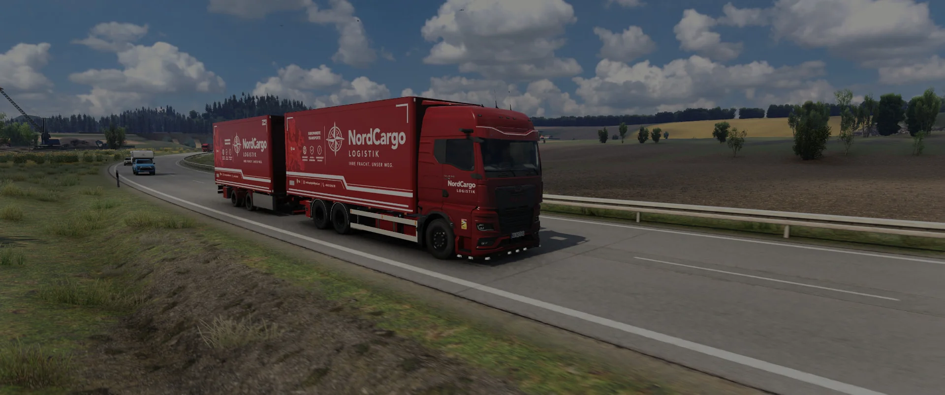 NordCargo MAN auf einer Landstraße
