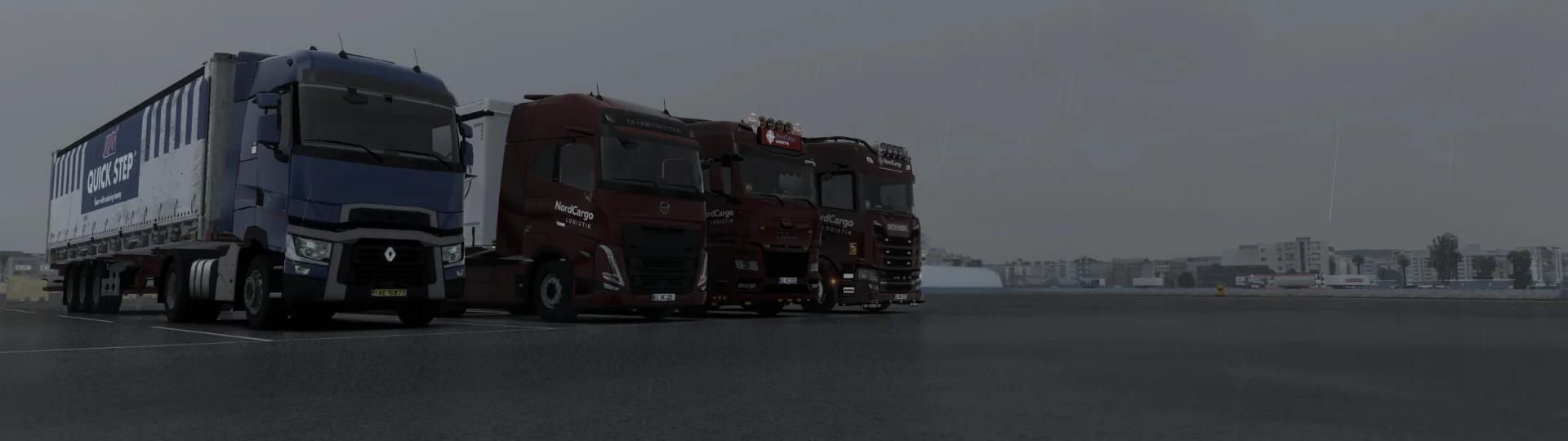 NordCargo Flotte nebeneinander im Regen
