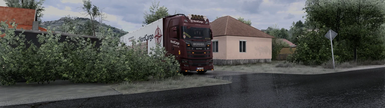 NordCargo Scania auf einer Landstraße